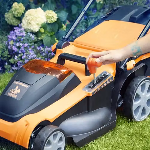 LawnMaster MX 24V Orange Cordless Lawnmower with 41cm Cutting Width, Spare Battery, Collection Bag and Mulching Kit – 3