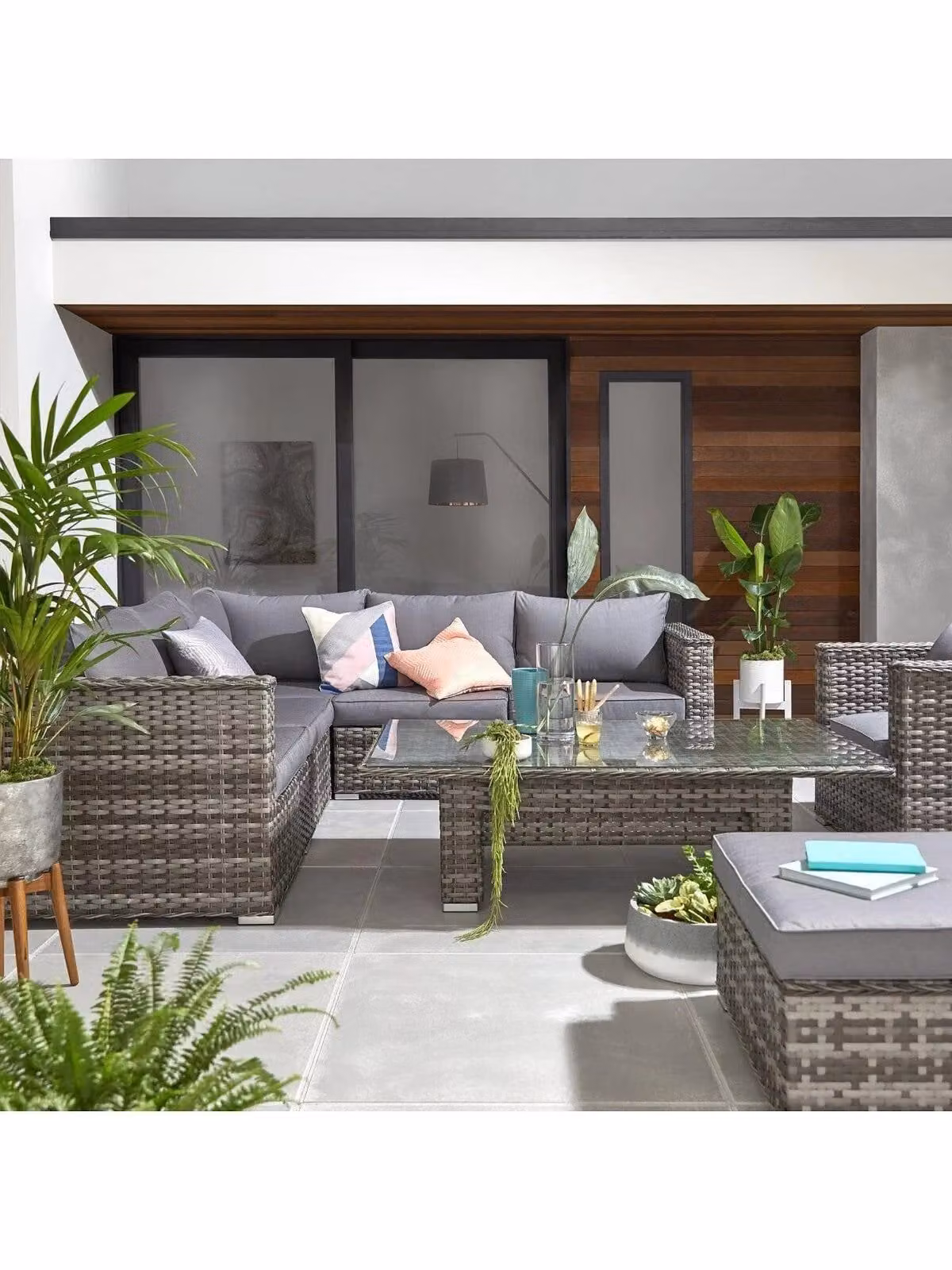 Cheap Furniture Warehouse Aruba 6-Seater Grey Polyrattan L-Shape Corner Garden Sofa Set with Left-Facing Lounge Armchair, Ottoman, and Height-Adjustable Glass Coffee Table