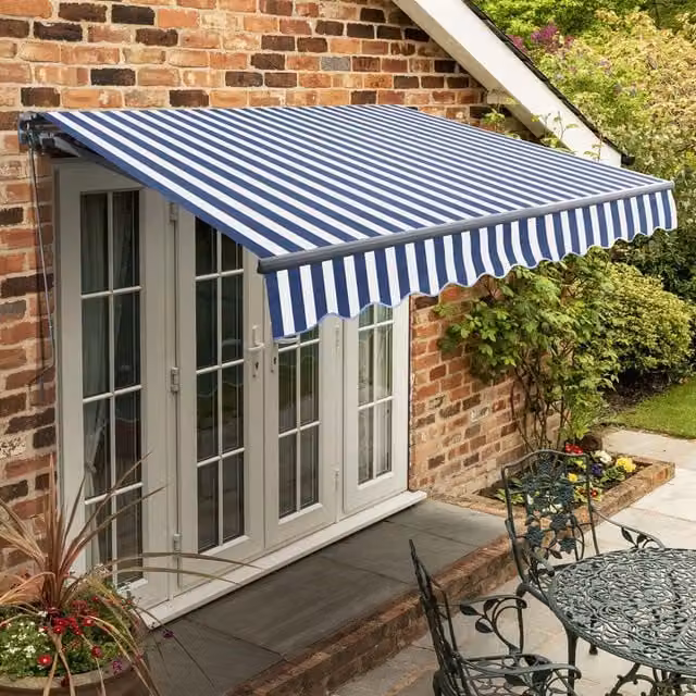 Primrose Manual Folding Arm Patio Awning with Blue and White Stripes and Charcoal Aluminium Frame, Width: 300 cm, Depth: 18 cm