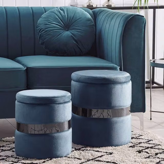 Wyld and Coco Set of 2 Light Blue Velvet Cylindrical Storage Pouffes with Metallic Band