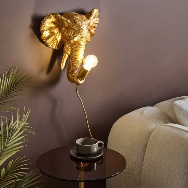 Wyld and Coco Gold Elephant Polyresin Wall Lamp for Bedside Reading