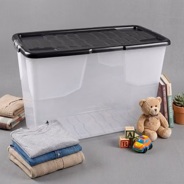 Storm Trading Group 100L Heavy-Duty Stackable Curved Plastic Storage Box with Black Lid, Transparent