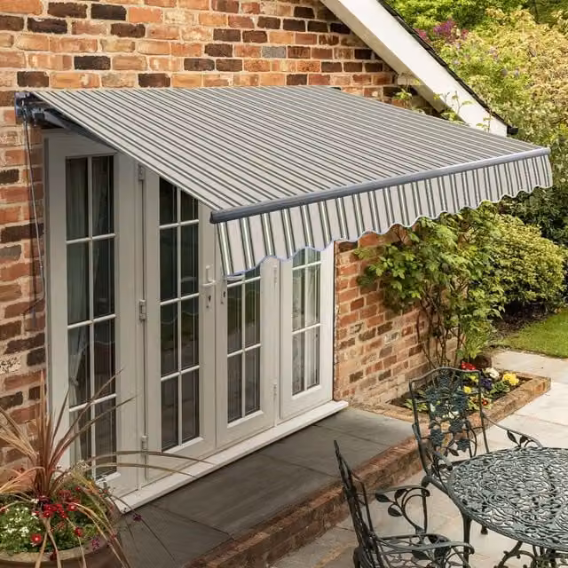 Primrose Manual Wall-Mounted Folding Arm Patio Awning with Multicolour Yellow Striped Fabric and Aluminium Frame, 4m