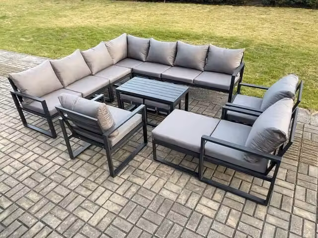 Fimous 13 Seater Outdoor Garden Furniture Set in Dark Grey, featuring a Powder Coated Aluminium L-Shape Corner Sofa, Oblong Coffee Table, 3 Chairs and 3 Matching Ottomans with Upholstered Cushions