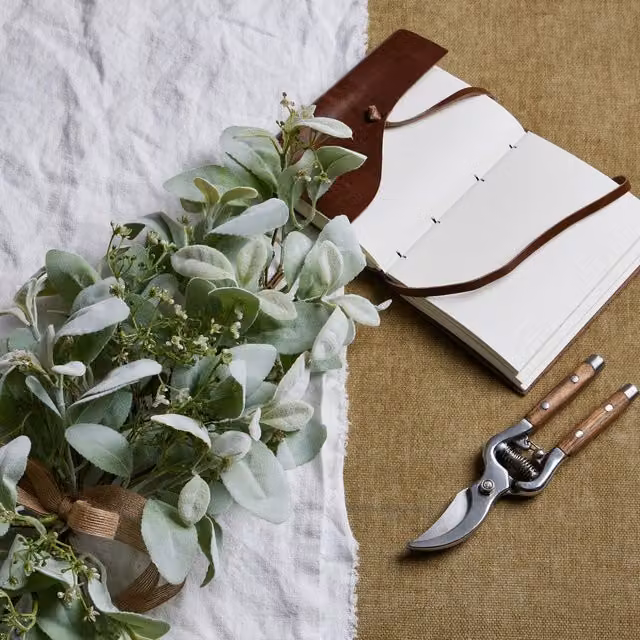 KDMK Winter Elegance Green Tabletop Spray with Lambs Ear and Wax Flower