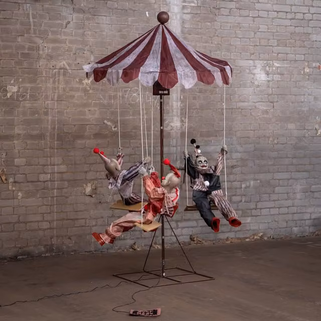 Samuel Alexander 6ft Tall Clown Go-Round Animated Halloween Prop Decoration in Red and Multicolour
