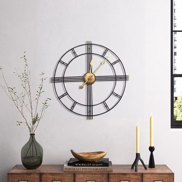 Komore Oversized Geometric Round Metal Wall Clock in Black and Gold