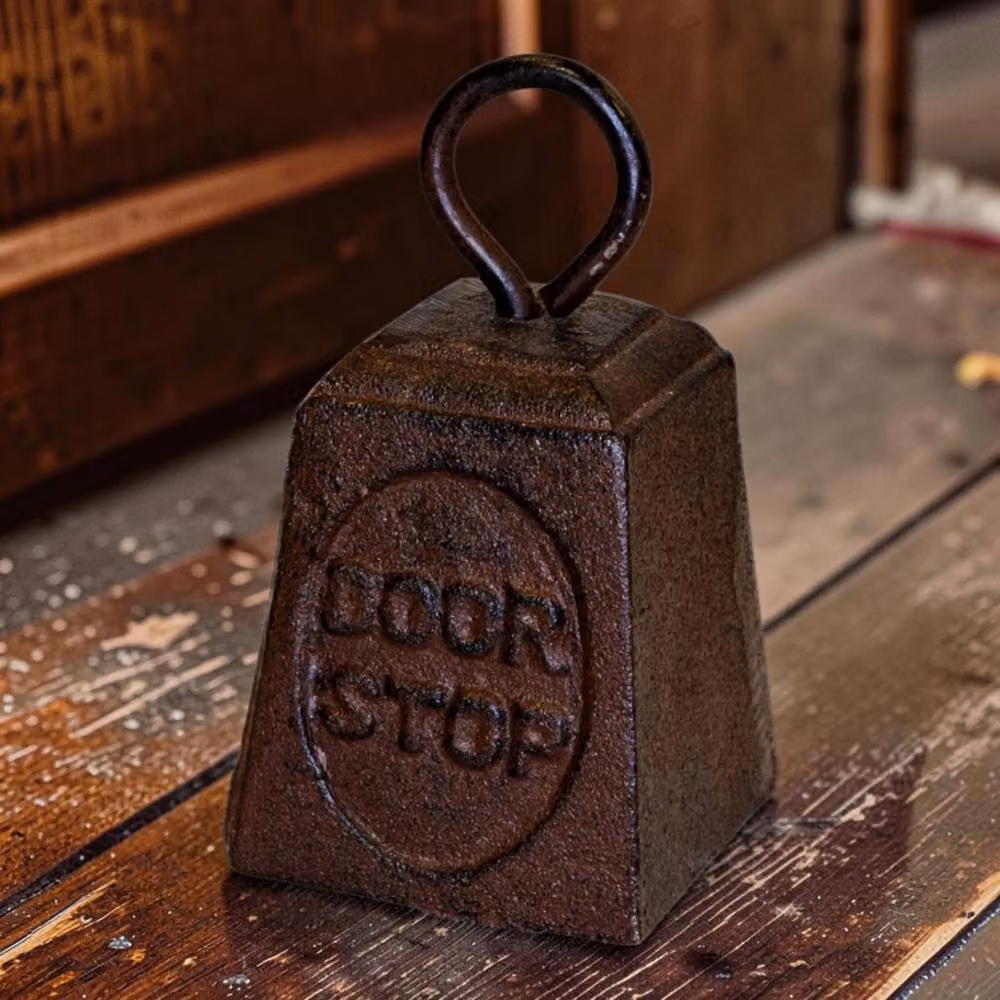 Four Candle Cast Iron Door Stop in Brown – 2