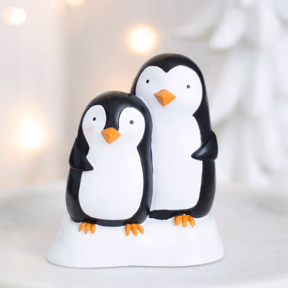 Uniqueful Snuggle Season Penguin Ornament in Black and Multicolour Resin