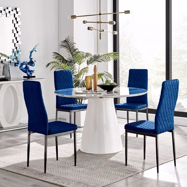 Furniturebox Palma White Marble Effect Round Dining Table and 4 Navy Velvet Milan Chairs with Black Legs