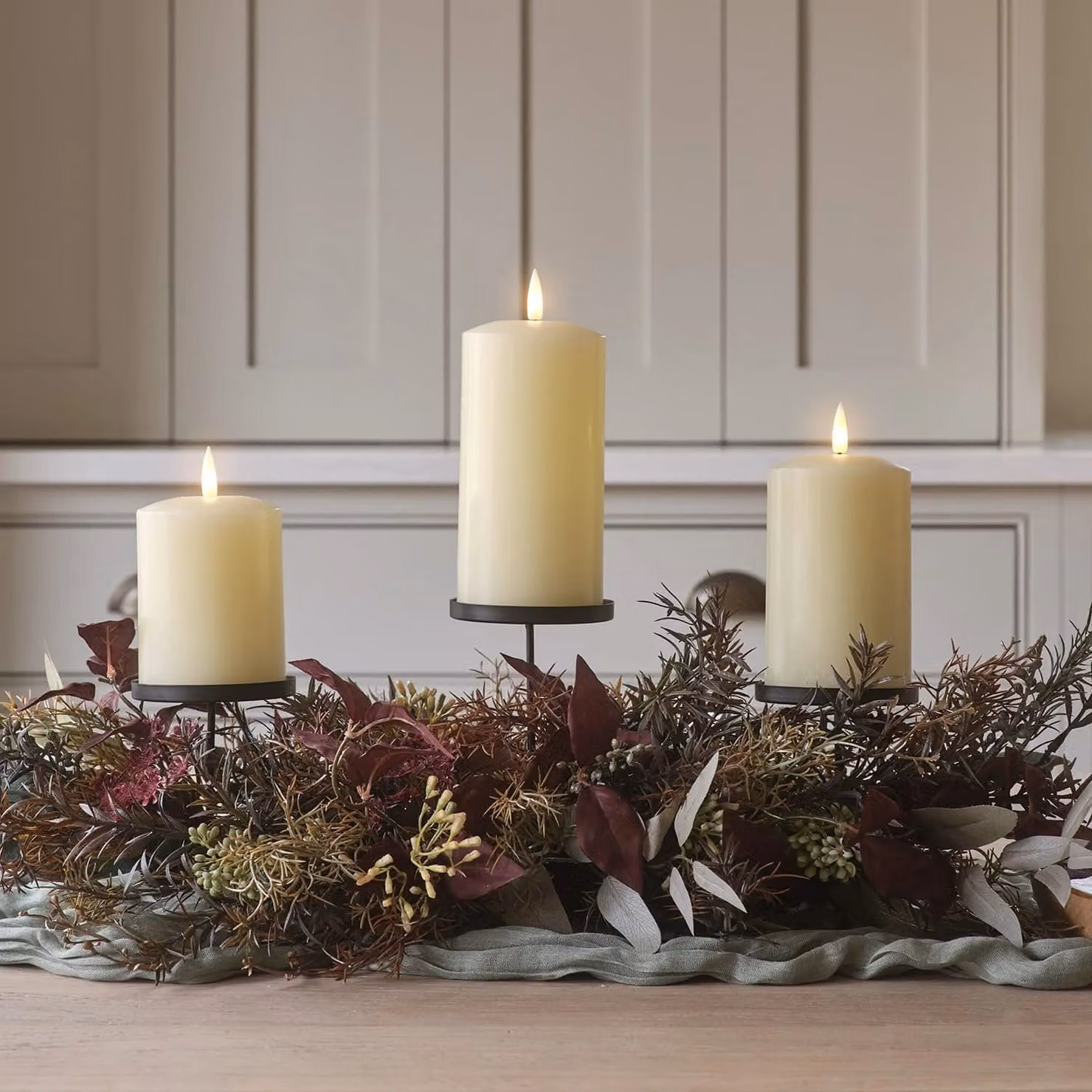 Autumn Winter Trio Metal Candle Holder with TruGlow Pillar Candles in Red, Grey, Green and White, Height: 70 cm