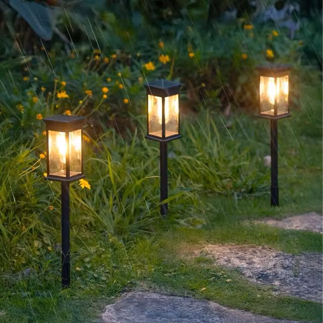 Livingandhome 8-Piece Solar-Powered Garden Pathway Lantern Lights in Black with Warm White Glow