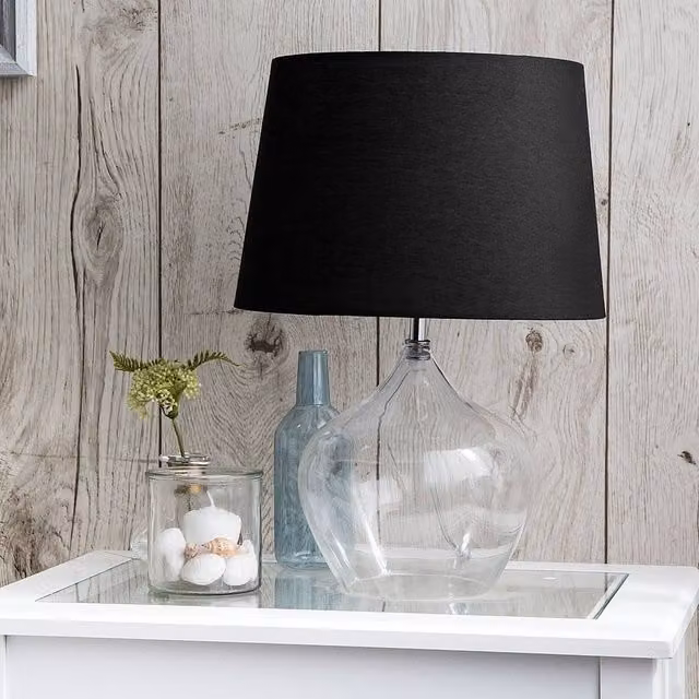 Wyld and Coco Modern Table Lamp with Transparent Glass Base and Black Fabric Drum Shade