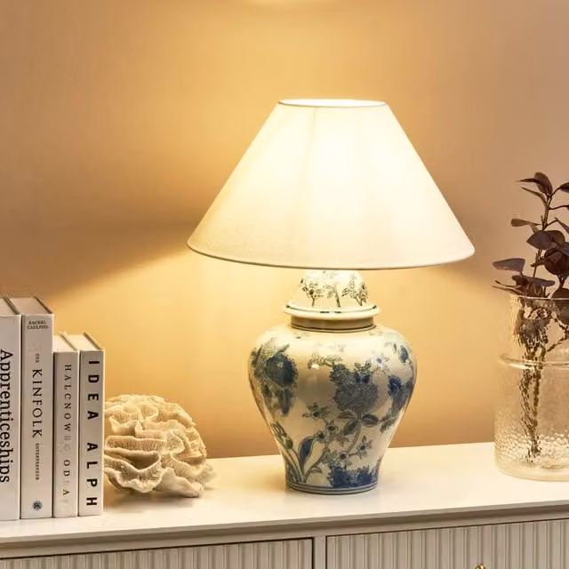 Wyld and Coco Blue and White Ceramic Floral Table Lamp with White Linen Shade – 1
