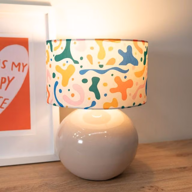 ValueLights Bosco Ceramic Sphere Table Lamp in Beige and Multicolour with Abstract Fabric Lampshade