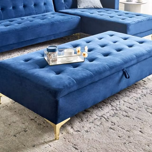 Wyld and Coco Navy Blue Velvet Tufted Storage Ottoman with Gold Legs