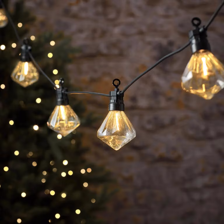 Lights4fun 10 Diamond Cap Warm White LED Outdoor Festoon String Lights with Timer in Black and Transparent