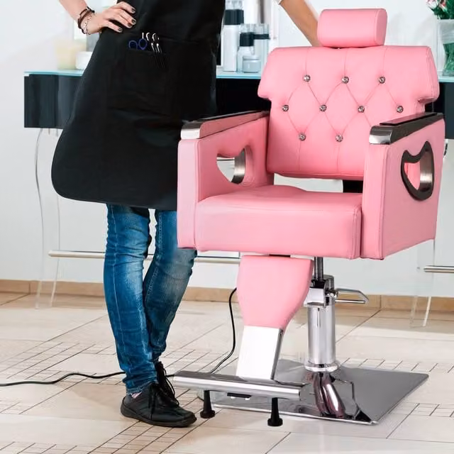 Costway Adjustable Swivel Barber Styling Salon Chair in Pink with Armrests
