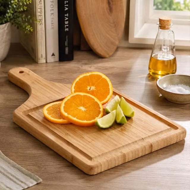 Orsina Bamboo Paddle Chopping and Serving Board in Natural Brown with Handle and Groove – 1