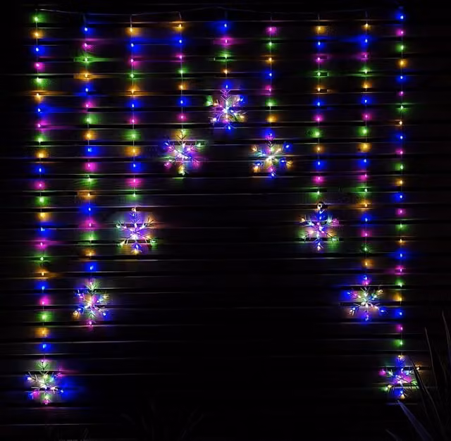 Samuel Alexander Multi Colour Red LED Snowflake Curtain Lights for Christmas Decorations, 1.2 m
