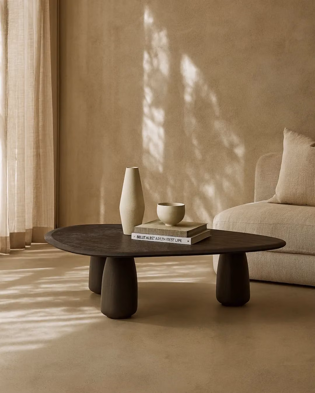 Tommy Franks Basilca Oval Coffee Table in Matte Black Oak Wood