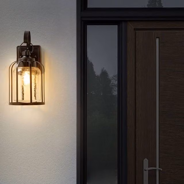 Wyld and Coco Retro Black Metal and Transparent Glass Outdoor Wall Lantern