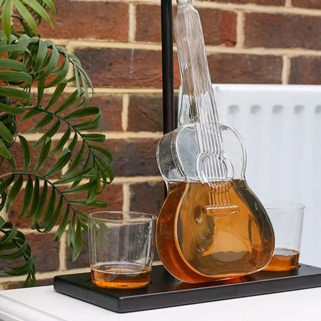 Menkind Connoisseur Creations Glass Guitar Decanter and Tumbler Set with Stand in Black and Transparent