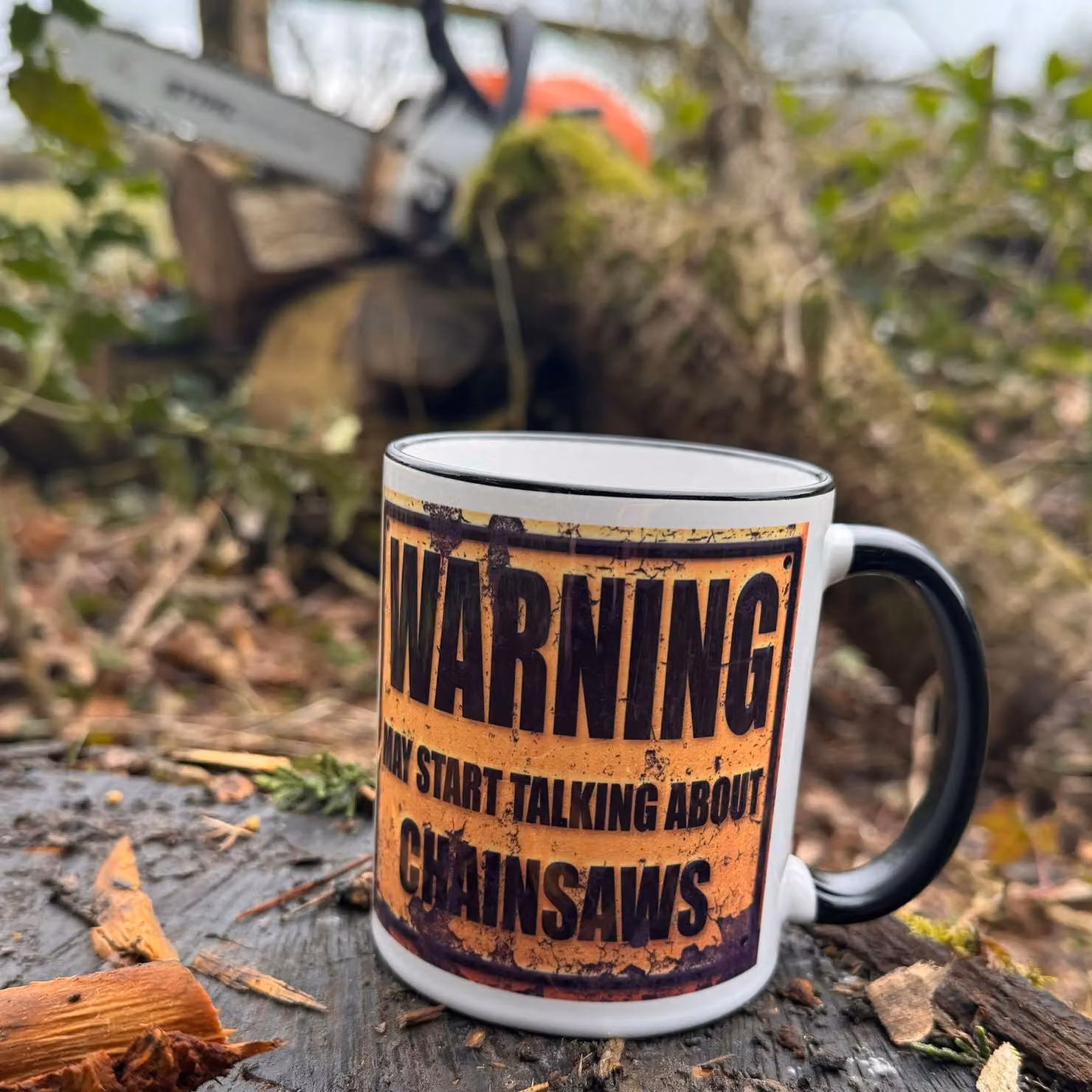 Bad Zebedee Warning May Start Talking About Chainsaws Ceramic Mug in Black, 300ml – 2