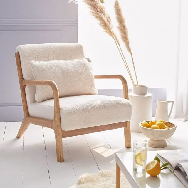 sweeek Scandi-style White Bouclé Fabric Armchair with Solid Wood Frame and Foam Cushion