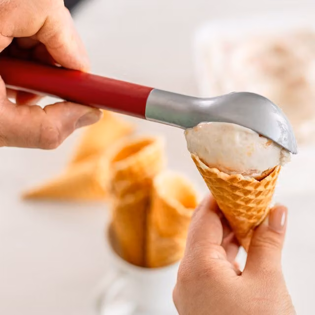 KitchenAid Ice Cream Scoop in Red with Stainless Steel Construction and Ergonomic Handle