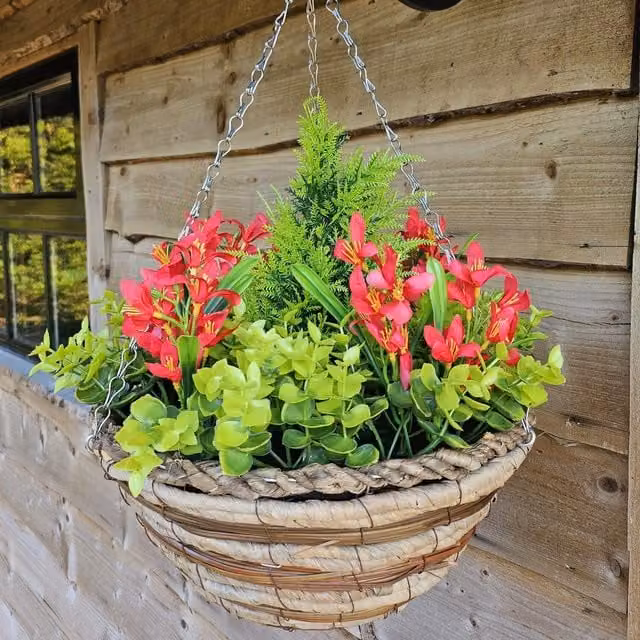 Artificial Red Mini Daffodil Floral Display in a Round Woven Rattan Hanging Basket, Diameter: 25.4 cm