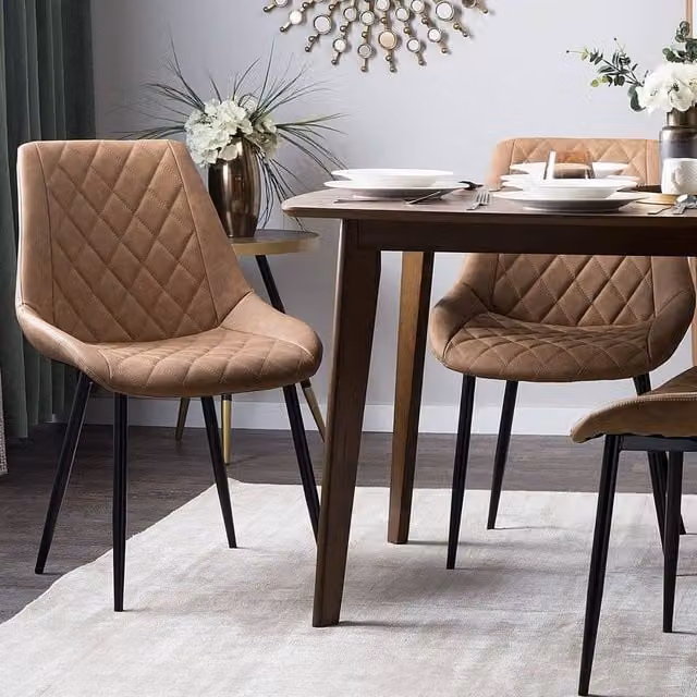 Wyld and Coco Set of 2 Brown Quilted Faux Leather Dining Chairs with Black Powder Coated Iron Legs – 1