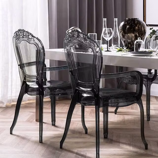 Wyld and Coco Set of 2 Transparent Black Polycarbonate Stackable Dining Chairs with Armrests – 1