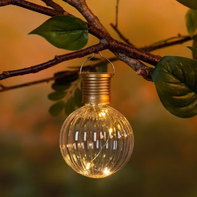 Lumineo Hanging Solar LED Bulb Lantern in Transparent and Gold/Brass with Warm White Light