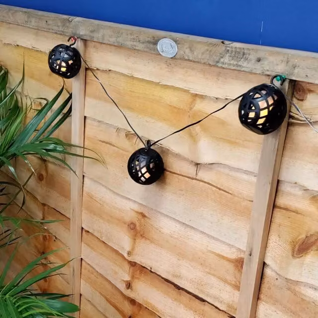 Premier 10 Flickering Flame Lantern String Lights in Black