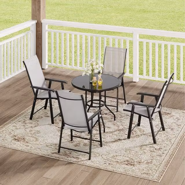 Komore Classic Metal Outdoor Garden Table with Parasol Hole and Four Folding Chairs in Matt Black