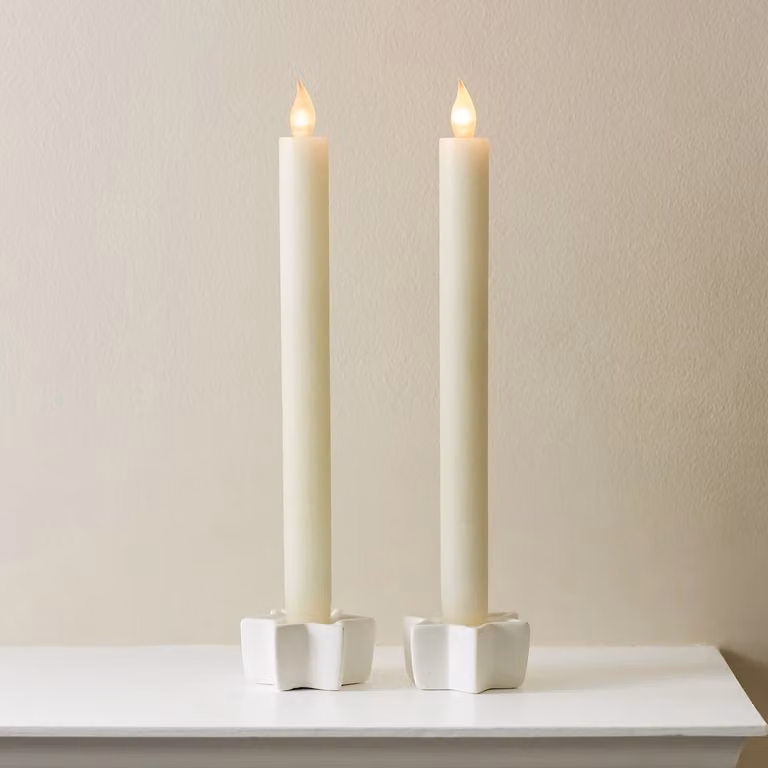 Lights4fun Set of 2 Ivory Real Wax Battery Operated LED Taper Candles with Flicker Effect