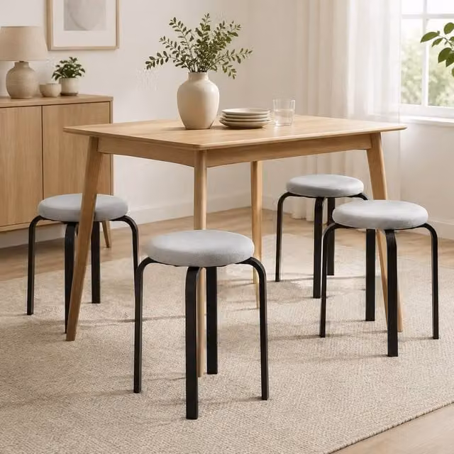 STILVORA Set of 4 Stackable Modern Stools with Grey Fabric Cushioned Seats and Metal Frames – 1