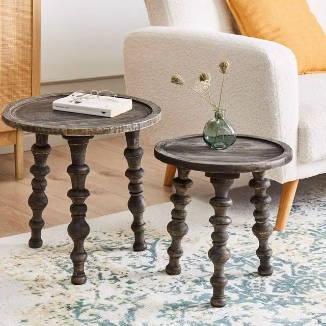 Wyld and Coco Set of 2 Brown Mango Wood Side Tables with Round Nested Tops and Rustic Lacquered Finish