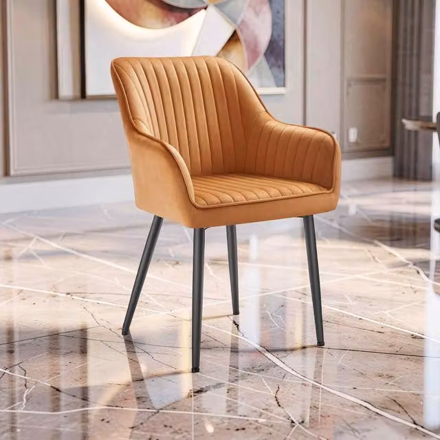 The Bazaarist Modern Velvet Dining Chair with Armrests and Metal Legs in Caramel Brown and Ink Black