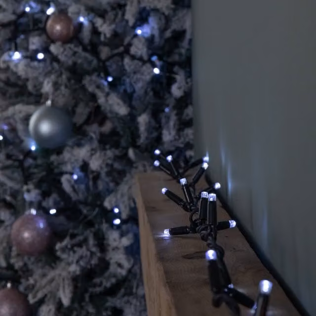 Samuel Alexander Connectable Christmas LED String Lights with 300 White LEDs in Black – 1