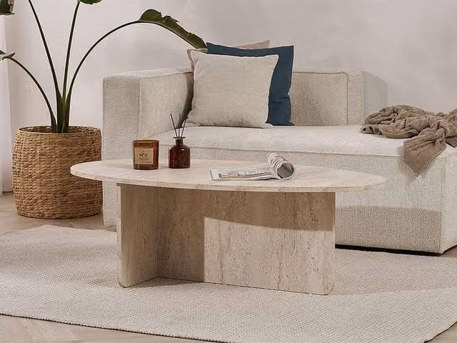 Vente-unique ISENORA Oval Coffee Table in Beige with Travertine Effect and X-Frame Design