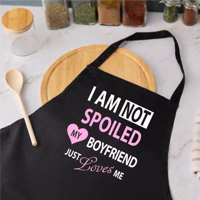 60 Second Makeover Women's I'm Not Spoiled My Boyfriend Just Loves Me Cotton Apron in Black