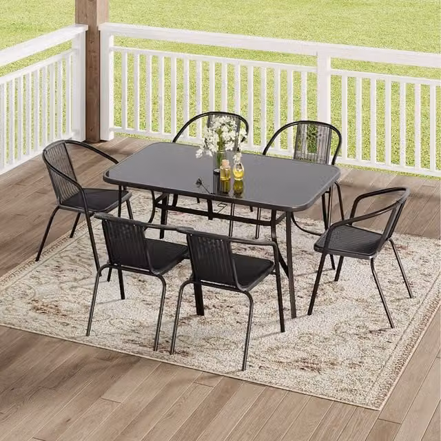 Komore Black Rectangular Tempered Glass Garden Table and Seven Polyrattan Chairs Set