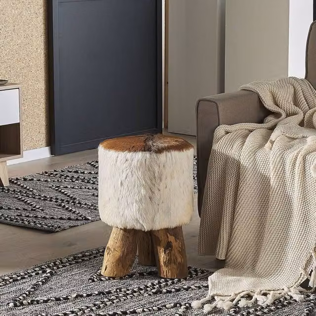 Wyld and Coco Rustic Brown Goatskin Leather Footstool with Teak Wood Tripod Legs – 1