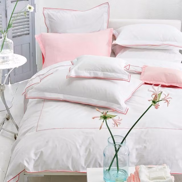 Designers Guild Astor Cotton Percale Duvet Cover and Pillowcase Set in Pink and White
