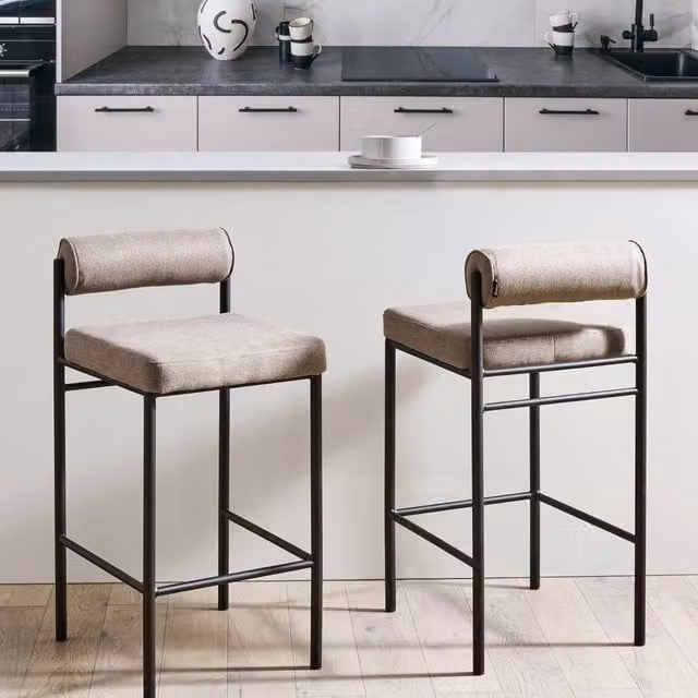 Wyld and Coco Set of 2 Taupe Armless Bar Stools with Roll Backrest and Black Powder Coated Metal Legs in Beige
