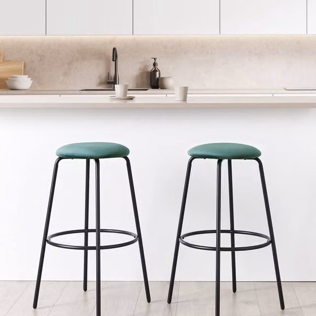 Wyld and Coco Emerald Green Velvet Armless Bar Stools Set of 2 with Black Metal Legs – 1