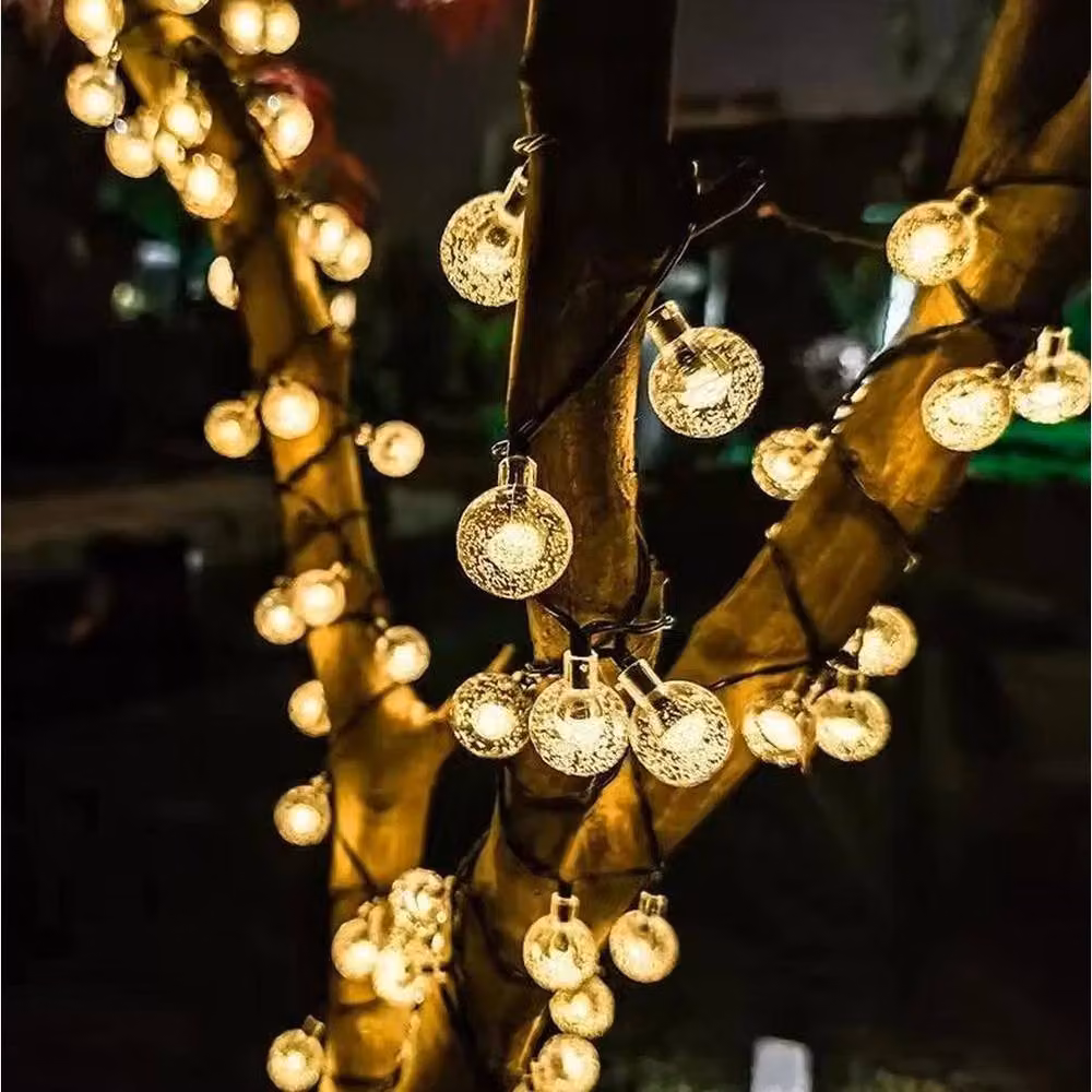 NESTLUNE 130 LED Solar Powered Waterproof Fairy Lights in Black with Warm White Sphere Bullets and Dusk Sensor, 15m – 5