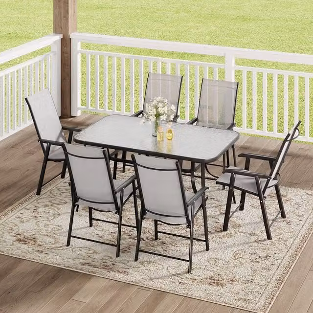 Komore 6 Seater Black Patio Set with 150 cm Glass Table and 6 Foldable Chairs